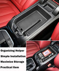 BMW X3 G01 2018-2024 And BMW X4 G02 2019-2025 Center Console Organizer Tray, black plastic, installed in vehicle armrest, close-up view