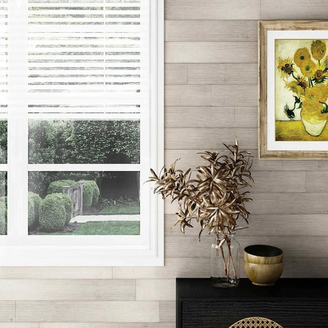 Living room with Real Wood Shiplap Wall Planks White 5 Inch Peel And Stick Boards Set Of 10 12.5 Sq Ft accent wall, window view.