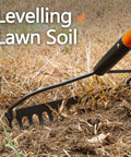 Heavy Duty Garden Rake With 14 Tines And 58 Inch Fiberglass Handle Built To Last High Carbon Steel Build in use on soil