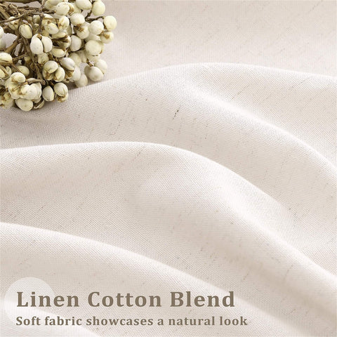 Close-up of cream ivory linen cotton blend fabric with natural texture and small white flowers on the side.