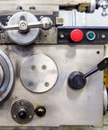 Industrial lathe with Revolving Handle Grip Set Phenolic Tapered Handles With Brass Insert installed for machine operation