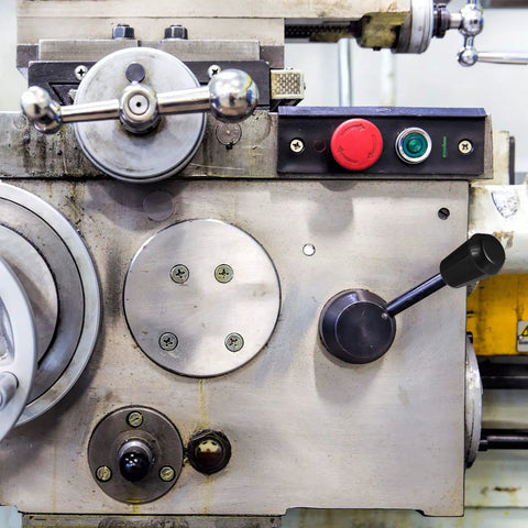 Industrial lathe with Revolving Handle Grip Set Phenolic Tapered Handles With Brass Insert installed for machine operation