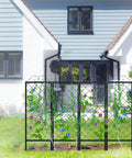 Two Pack Metal Garden Trellises For Climbing Plants 53.5 Inch Tall Plant Support Fence Trellis for flowers in front of a house