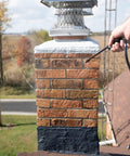 Heavy Duty Siloxane Chimney Brick Sealer Keeps The Wet Out For Good With A Clear Breathable Waterproof Coating applied to chimney.