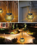 Two Pack 15 Inch Outdoor Solar Lantern Lights, Decorative Metal Hanging Lanterns illuminating garden pathway at night with warm glow