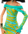 Cleo De Nile Fashion Figure Featuring A Chic Asymmetric Wrap Dress And Bold Over The Shoulder Neckline, vibrant dress detail.