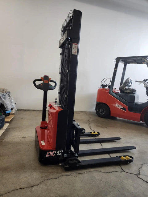 Built Tough Electric Pallet Stacker Packing 2600 Lbs Capacity Boasting Quick 118 Inch Lift Height with red and black design.