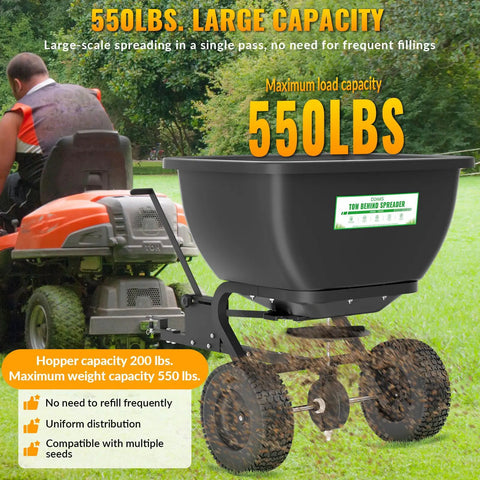 Heavy Duty Tow Behind Broadcast Spreader With 200 Lb Hopper And 13 Inch Pneumatic Tires attached to lawn tractor