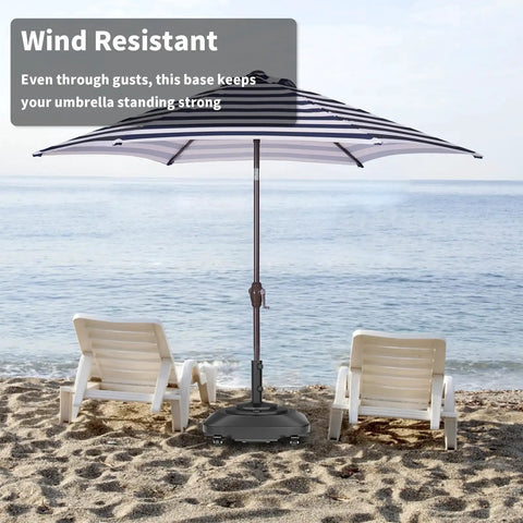 Beefed Up Patio Umbrella Base With Wheels Fillable To 100 Lb Windproof Mobile Square Market Stand on sandy beach setting