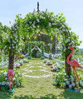 Metal Garden Arch Wedding Arbor With Gothic Spires 9.5 Ft High 4.1 Ft Wide Pergola adorned with flowers for outdoor ceremony