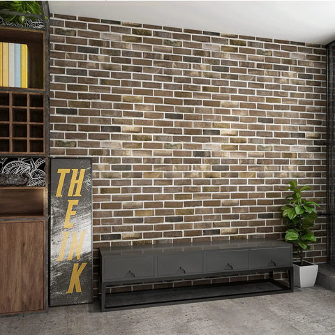 Peel And Stick Faux Brick 3D Wall Panels 10 Pack 52.5 Sq Ft in Gray Brown installed on living room wall with modern furniture.