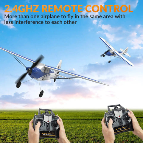 Sport Cub 500 S2 RC Plane Ready To Fly 4 Channel RC Airplane With Gyro Stabilization flying with two controllers against blue sky.
