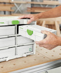Person using Festool DuoPower Anchor Set 5 6 8 10 Mm With 6 x 35 Chipboard Anchors In MINI Systainer S 76 in workshop