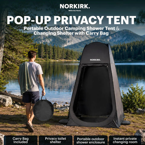 Man holding carry bag near Pop Up Privacy Tent With Mesh Floor For Quick Outdoor Shower by lake.