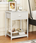 Small Space Friendly White Nightstand With Fabric Drawer And 3 Tier Storage End Table in bedroom setting