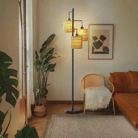 65 Inch Boho Rattan Floor Lamp With Three Lights in living room, rattan shades, warm ambient lighting with plants and sofa