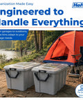 Kick Butt Heavy Duty 50 Gallon Storage Bins with Crystal Clear Lids Nesting Stackable Plastic Totes Hold All Tools Seasonal Gear and Bulky Clutter 2 Pack Grey near a camping site with a tent.