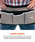 Man wearing Arsenal 5706 Canvas Waist Tool Apron with 13 pockets and dual hammer loops for front access, shorter length work apron
