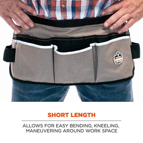 Man wearing Arsenal 5706 Canvas Waist Tool Apron with 13 pockets and dual hammer loops for front access, shorter length work apron