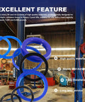 Rotary lift hydraulic cylinder seal kit with blue rubber seals and black ring in workshop.