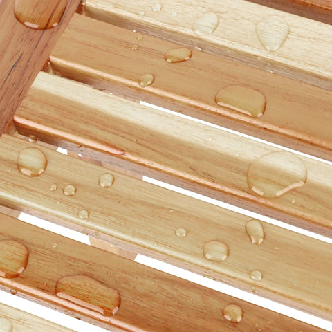 Teak Shower Stool For Shaving with water-resistant surface showcasing water droplets on 12 Inch Compact Foot Stool slats