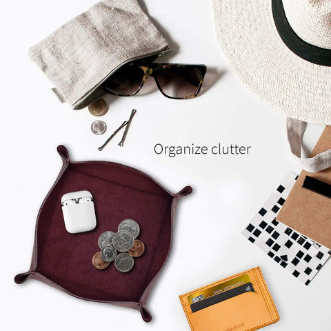 Handmade Italian Tumble Leather Valet Tray Organizer for desk in wine finish with coins and earbuds displayed on a surface.