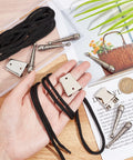 3 Sets Iron Bolo Tie Findings Kit With Sterling Silver Plated End Caps Textured Round Slides Black Cord And Replacement Buckle Clasps For DIY Wallets Bags And Jewelry Making displayed on a table with accessories.