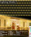Color Changing Christmas Net Lights RGB 204 LED Mesh For Outdoor Decor 9.8x6.6 Ft With Remote 35 Colors lit on a house