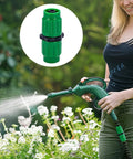Woman using 4 Pack Expandable Garden Hose Repair Kit With Universal Dual Channel Female And Male Connectors For 25 To 100 Foot Expandable Hoses
