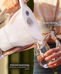 No Fuss 2.7 Liter Water Filter Jug With Magnesium Mineralizer Cartridge pouring water into a glass, showcasing easy handling and design.