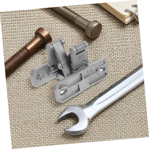 TEHAUX concealed stainless steel door hinges with mounting plates and pins, shown with a wrench on a woven mat