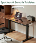 Top Shelf Electric Standing Desk With Ultra Wide Worktop Effortless Height Adjustment Hidden Wire Basket Natural Walnut Finish, 60cm desktop with sleek laptop setup.