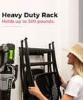 Person organizing chairs on 51 Inch Heavy Duty Garage Wall Organizer Rack With Adjustable Double Layer Hooks Carbon Steel Wall Mount