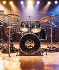Two Pair Clear Pvc Piano Style Living Hinges Forty Eight Inch Flexible Tape For Acrylic Plexiglass And Glass Panels Perfect For Golf Carts With No Sweat Adhesiveless Installation on stage next to a drum set.