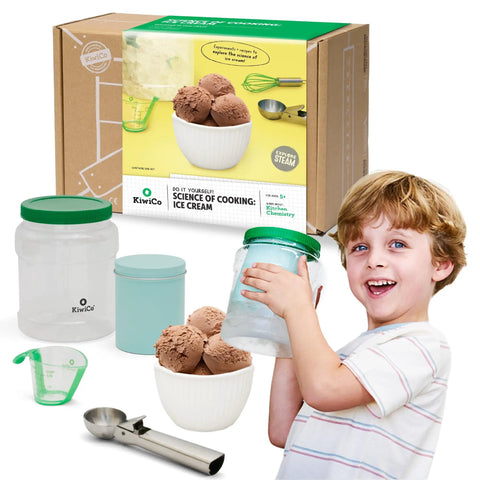 Child enjoying Science Of Cooking Ice Cream Kit For Kids: DIY Hands On Kitchen Chemistry Project with ice cream scoop and containers.