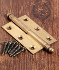 Dope Vintage Industrial Folding Butt Hinges For Cabinets And Boxes By Dophee, Antique Brass 2-Pack With Screws, shown on wood surface