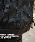 Close-up of Camera Pack 25L With Ladder And Two Small Camera Cubes For DSLR Gear showing water-resistant material and zippers.