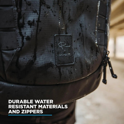 Close-up of Camera Pack 25L With Ladder And Two Small Camera Cubes For DSLR Gear showing water-resistant material and zippers.
