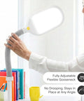 Person adjusting Litespan LED Floor Reading Lamp with flexible gooseneck, ideal for lash extensions and reading in living room.