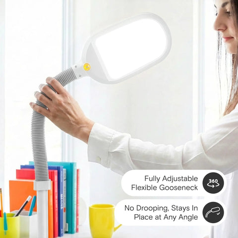 Person adjusting Litespan LED Floor Reading Lamp with flexible gooseneck, ideal for lash extensions and reading in living room.