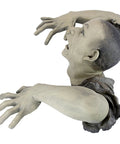 Zombie Of Montclaire Moors Indoor Outdoor Garden Statue Halloween Decor Creepy Graveyard Ghoul rising from the ground with open mouth