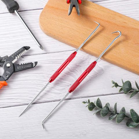 Professional Grade Grip Tight 4 Piece Hook And Pick Tool Set Double Pointed Scribe displayed with red grips and dual tips on a wooden surface.