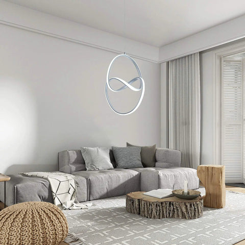 Lit Modern LED Pendant Light With Irregular Ring Design, 6000K, 33W silver fixture in contemporary living room setting