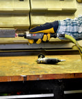 Tough As Nails Straight Pneumatic Die Grinder in use, polished metal surface with sparks, ideal for quick polishing and deburring.