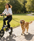 Electric Bike For Adults And Teens With A 500W Peak Motor, Lightweight Foldable Ebike, 20 MPH Top Speed, 25 Mile Range With Pedal Assist, Embedded Battery, Easy Fold Design, Ready For Commuting And Weekend Rides woman riding compact foldable ebike with dog on park path