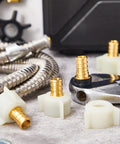 Four Pack One Half Inch PEX Female NPT Swivel Elbow Adapters Brass Crimp Fittings For Sink Faucets And RV Plumbing Water Lines Heavy Duty Brass And Plastic Construction Easy Install And Long Life, close-up on fittings