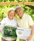 Smiling elderly couple holding a boxed Foldable Garden Kneeler And Seat With Anti Tipping Frame Widened Thick Soft Kneeling Pad Heavy Duty Gardening Stool With Tool Bag Workhorse Garden Bench For Weeding And Planting Great Gift For Women.