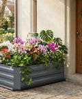 Two Pack Galvanized Raised Garden Beds With Bottom Indoor And Outdoor Use Rust Proof Metal Planter Box Easy Assembly No Leaks Great For Vegetables Herbs Patio Or Balcony Grey filled with colorful flowers on patio