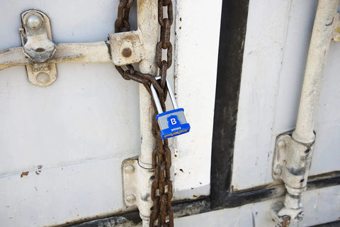 XT Series 44mm Laminated Steel Padlock With Two And Three Eighths Inch Shackle Weather Resistant And Hardened Boron Steel Lock on a gate