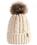Cozy Winter Beanie Knit Hat For Women Warm Fleece Lined With Faux Fur Pom Poms, beige, thick acrylic knit, cold weather wear.
